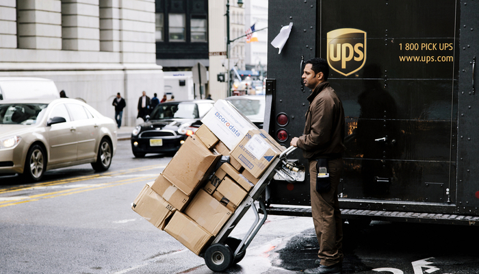 UPS to hire 100,000 people
